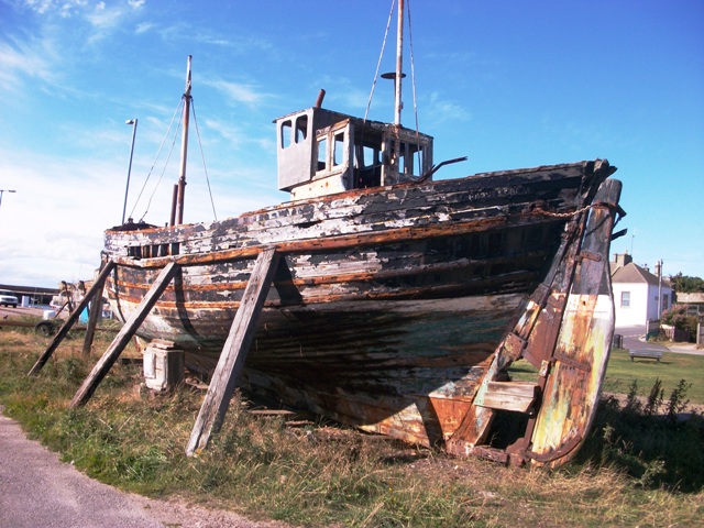 Boat in the harbour at Burghead